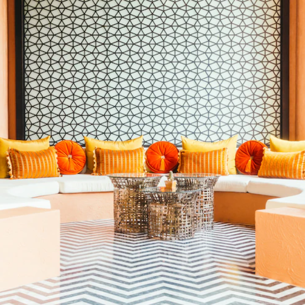 The mandala behind the sofa